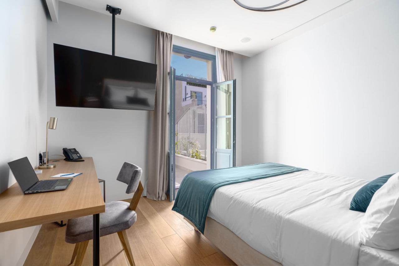 Hellenic Vibes Smart Hotel Athens Exterior photo A room at the hotel