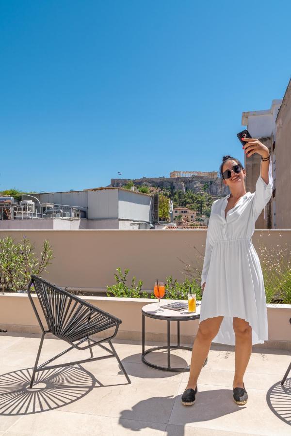 Hellenic Vibes Smart Hotel Athens Exterior photo A woman taking a selfie